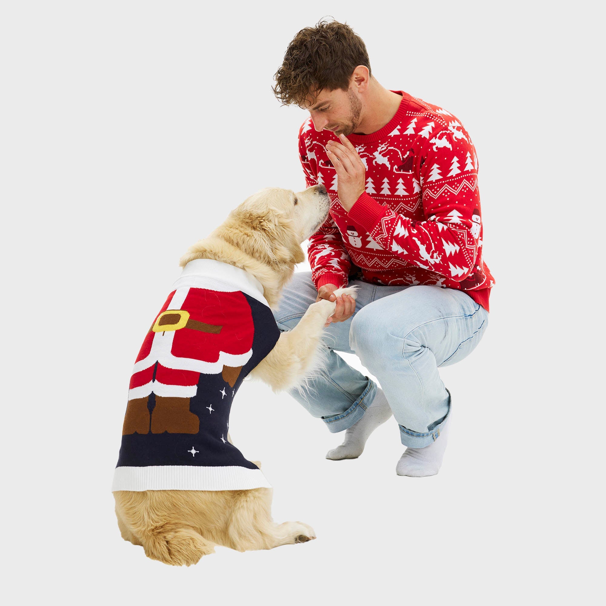 Santas lille hjelper julegenser til hund