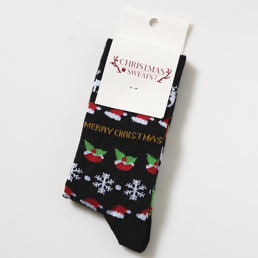 Svarte julesokker med julemønster på.
