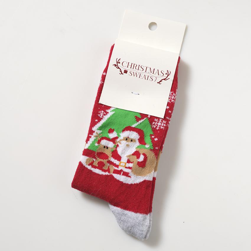 Røde julesokker med julenissen på.